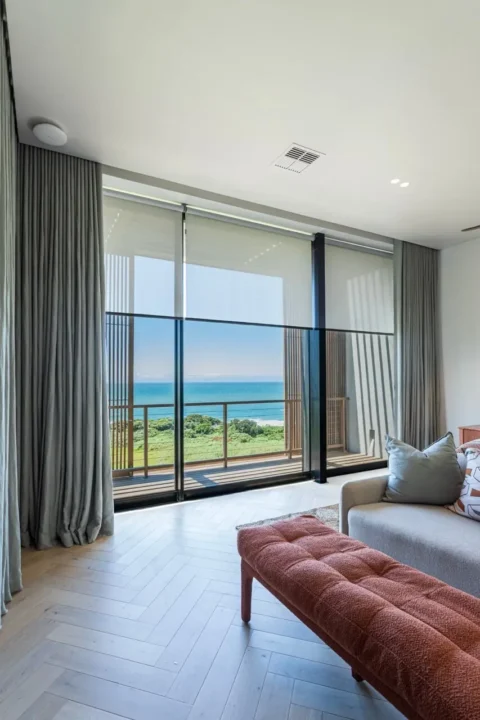 Pencil pleat curtains in a bedroom