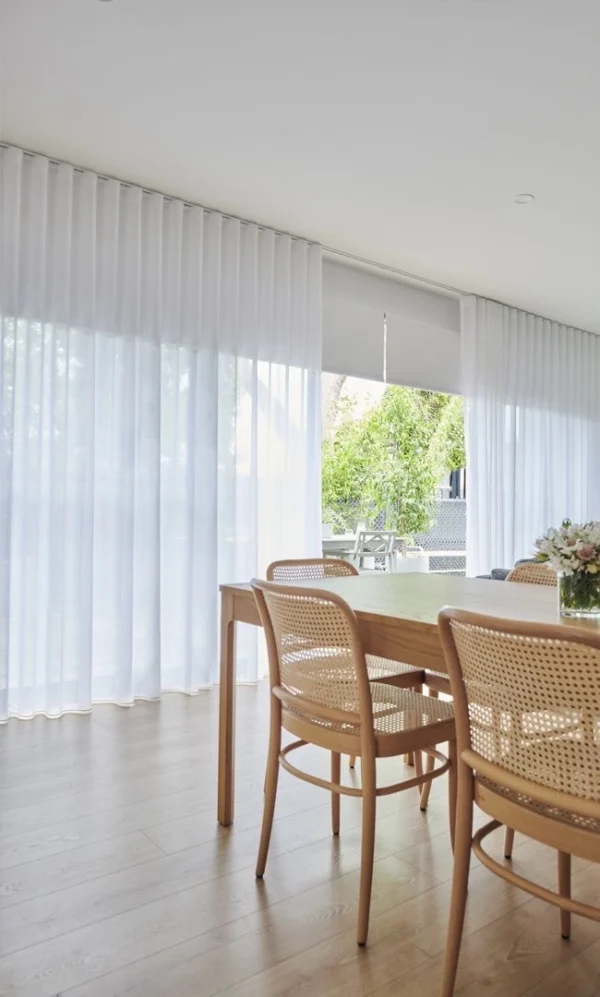 Sheer wave curtains in a living room