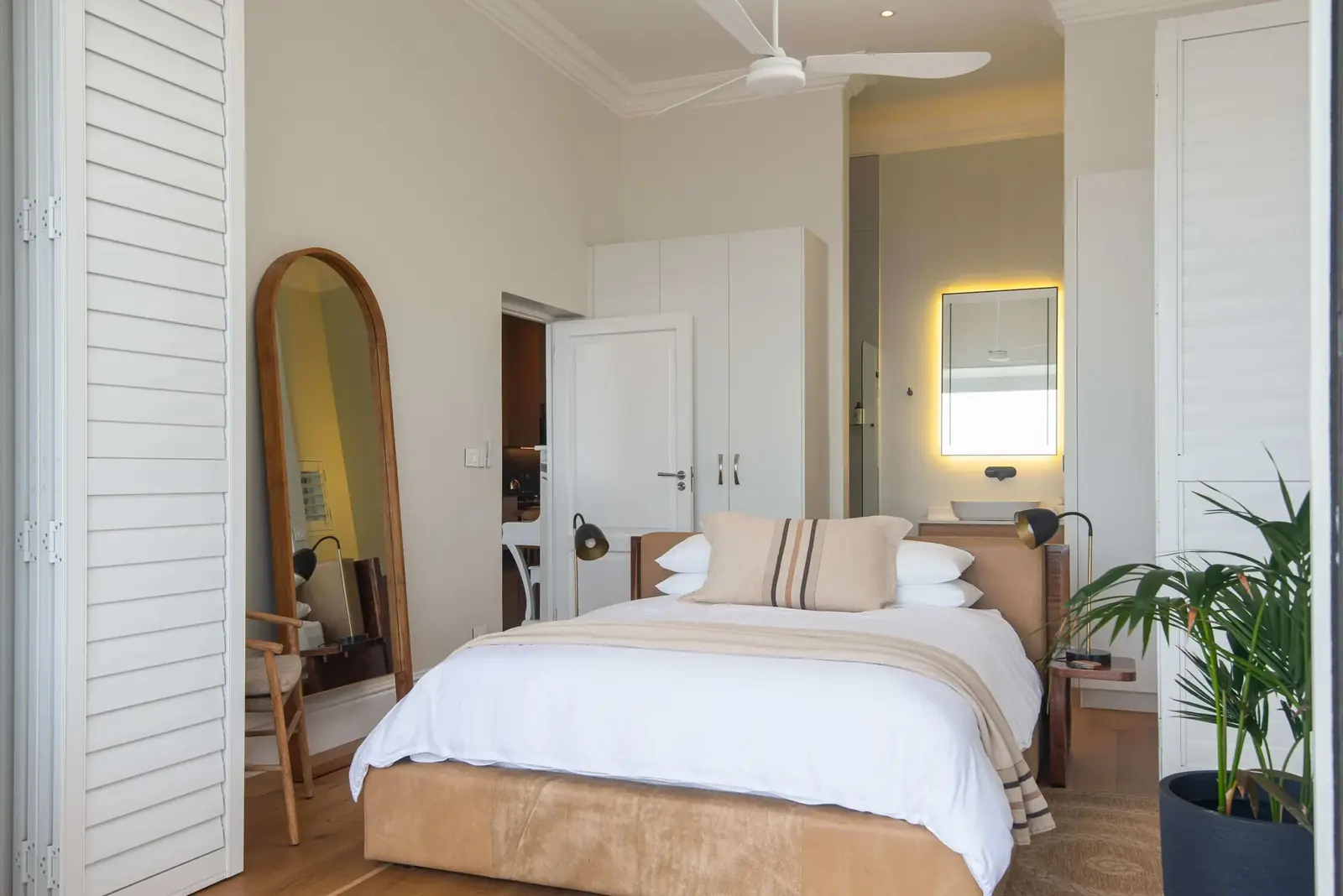 Custom bedroom shutters by The Window Boutique