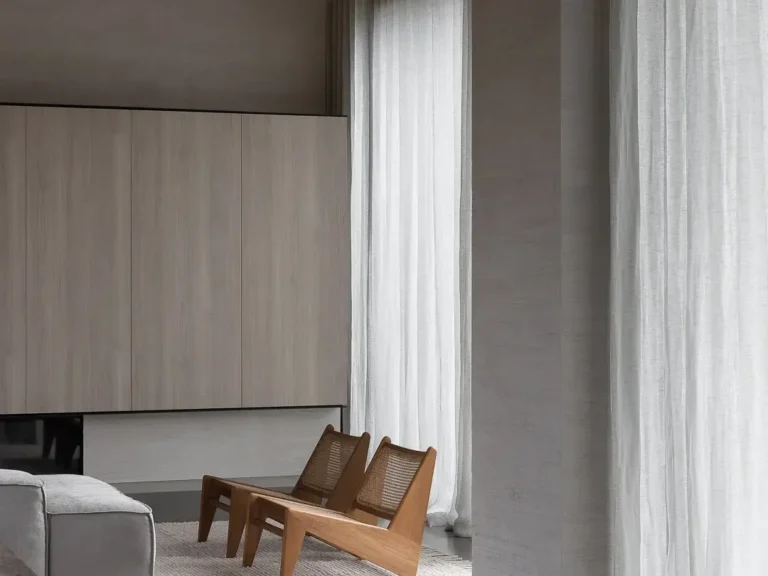Sheer curtains letting in soft light